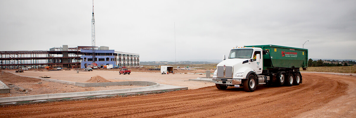 Photo of Kieffer Sanitation roll-off truck at Construction site.